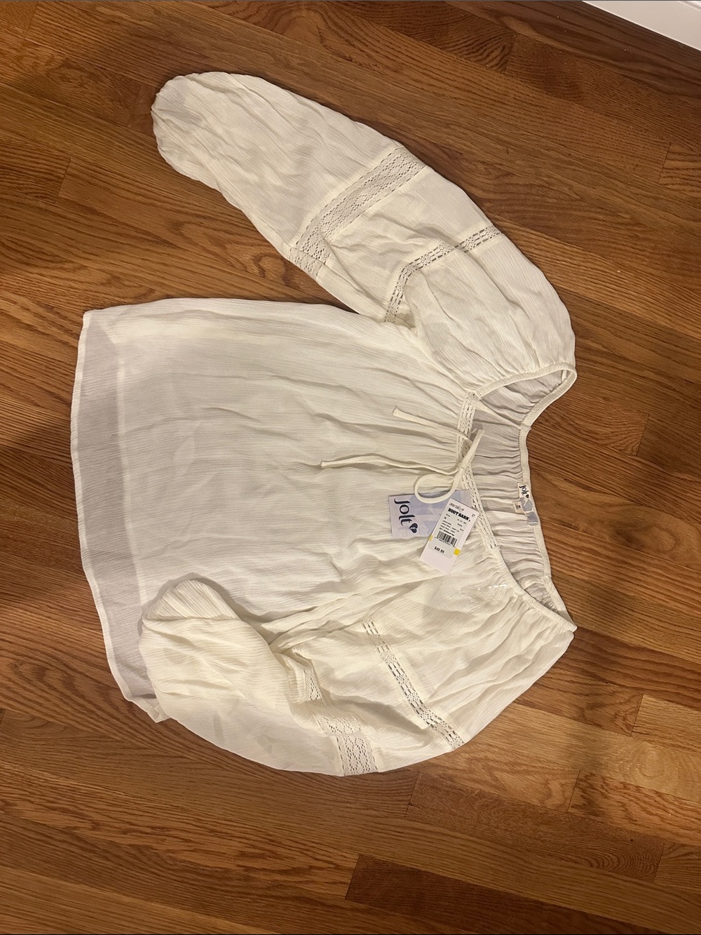 Jolt Women's Ivory Peasant Tunic with Tie Neck. NWT.  M.